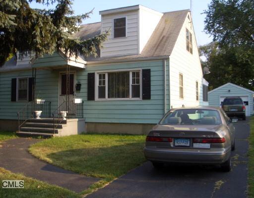 261 Old Town Road Bridgeport, CT 06606 - Photo 1 of 1 a view of a house with a yard