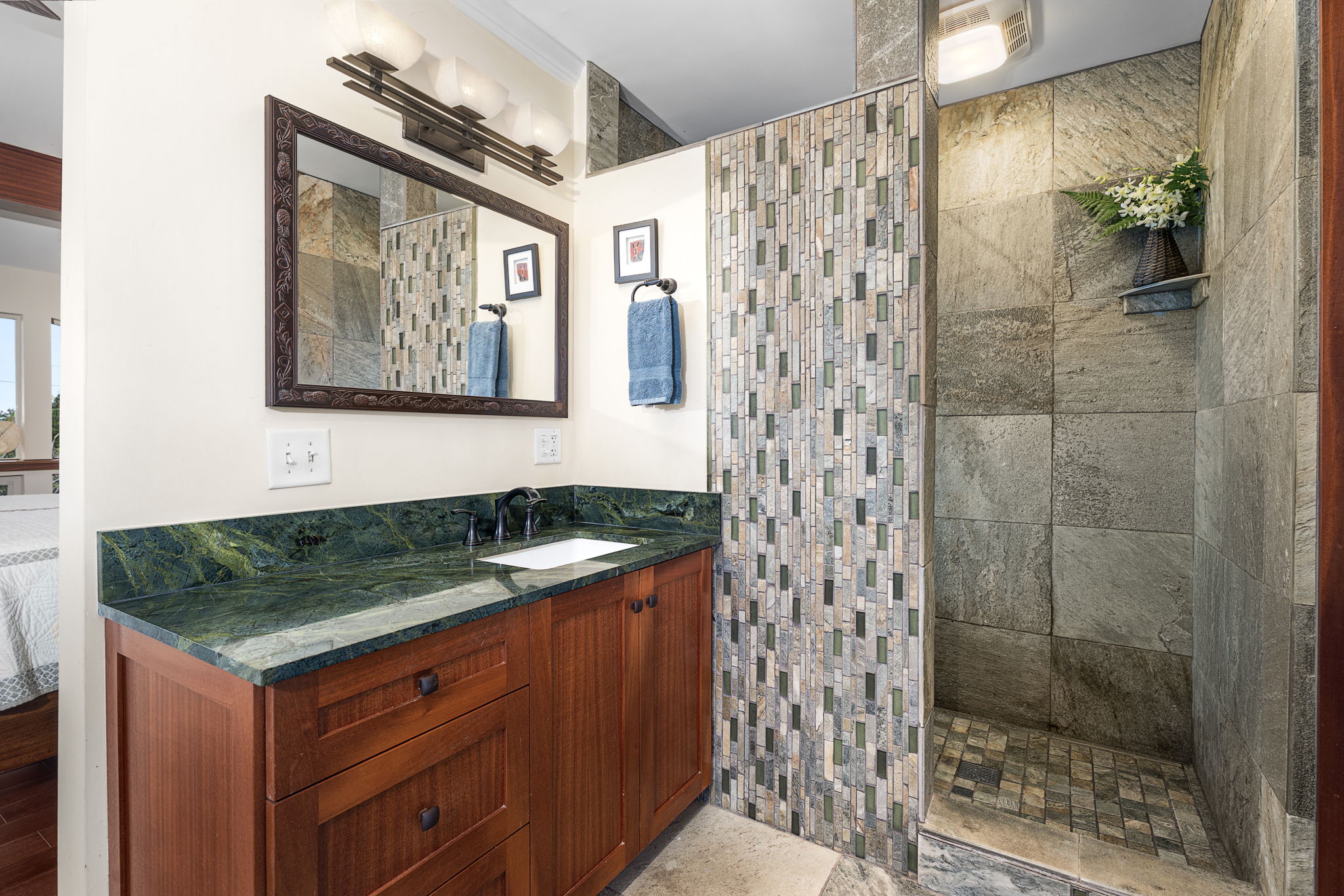 78-6960-a Walua Road Kailua-Kona, HI 96740 - Photo 19 of 29 a bathroom with a granite countertop sink a mirror and shower