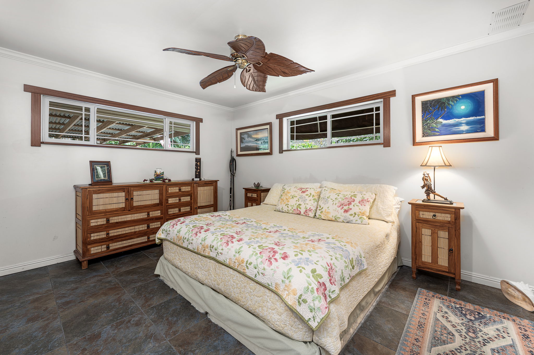 78-6960-a Walua Road Kailua-Kona, HI 96740 - Photo 23 of 29 a bedroom with a bed and a chandelier