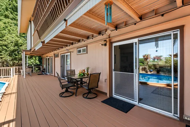 a backyard of a house with a patio