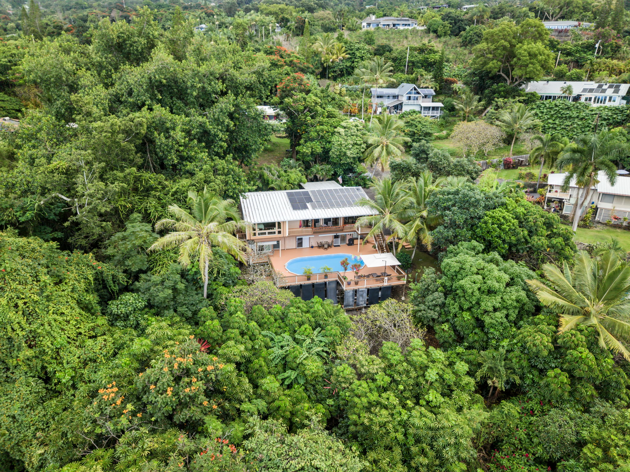 78-6960-a Walua Road Kailua-Kona, HI 96740 - Photo 5 of 29 an aerial view of a house with a yard