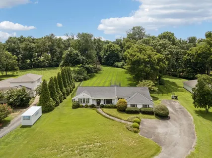a view of a swimming pool and lake view