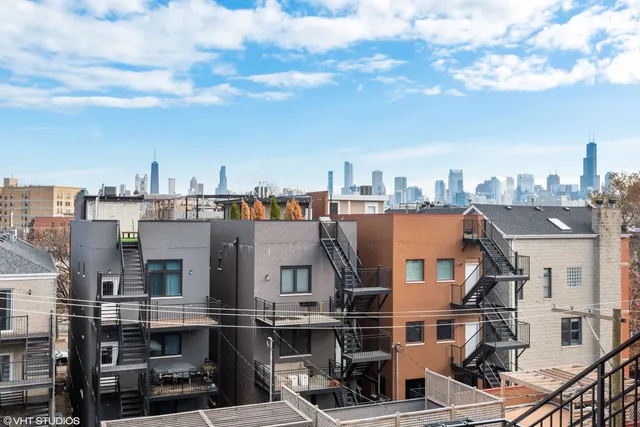 a view of a city with tall buildings
