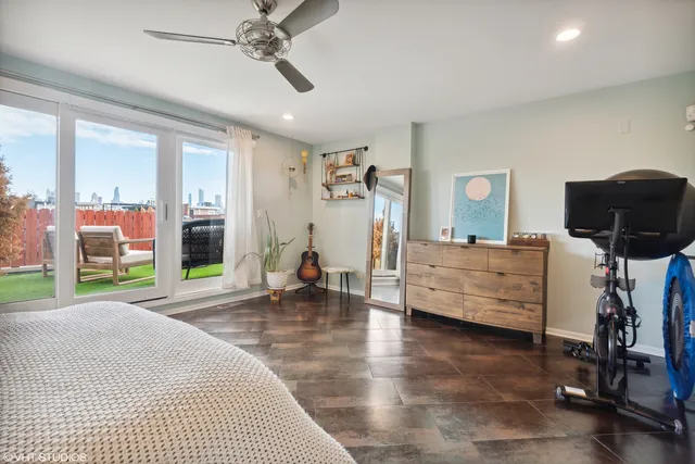 a bedroom with furniture and a chandelier