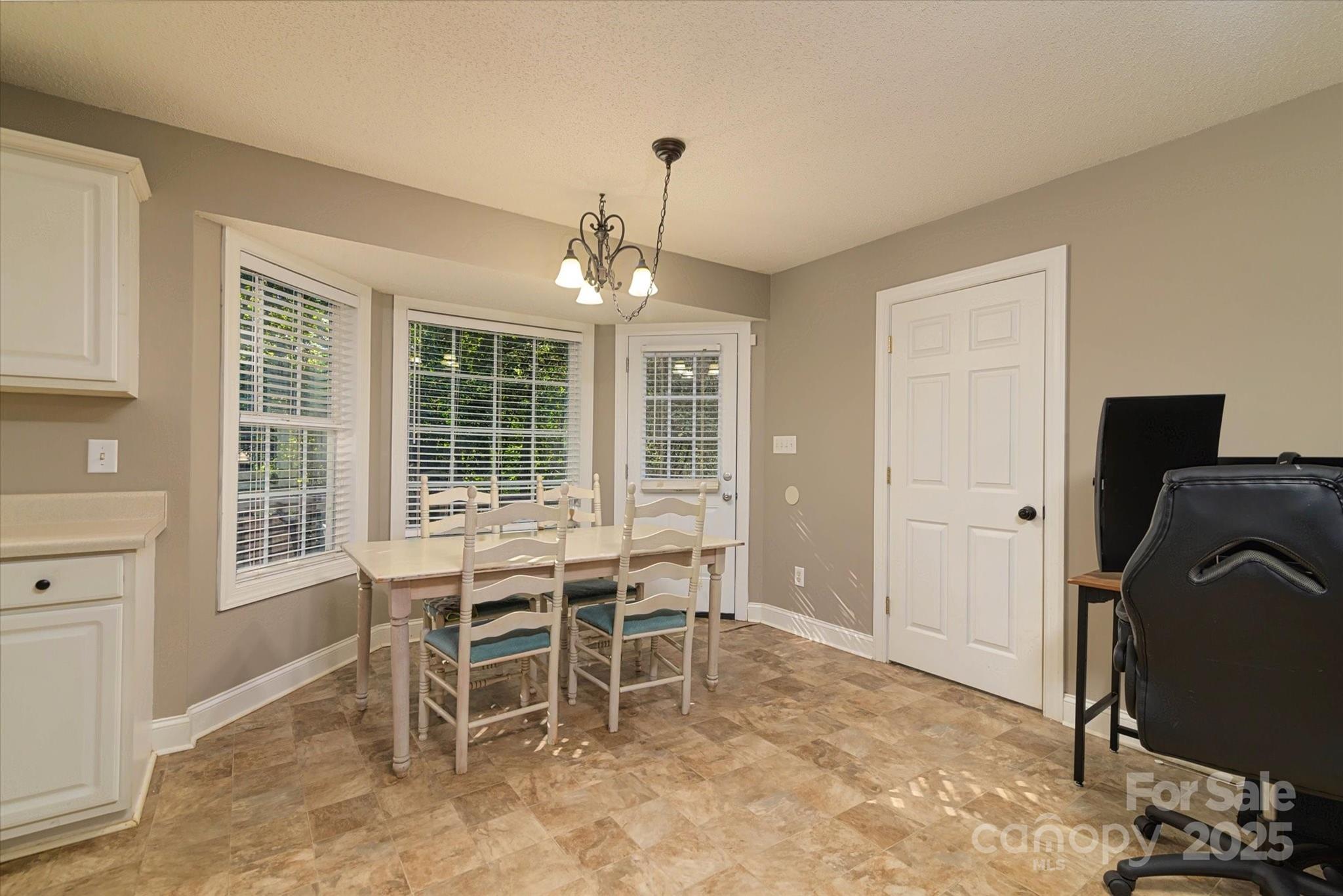 914 Ragin Lane Rock Hill, SC 29732 - Photo 15 of 31 a view of a dining room with furniture window and outside view