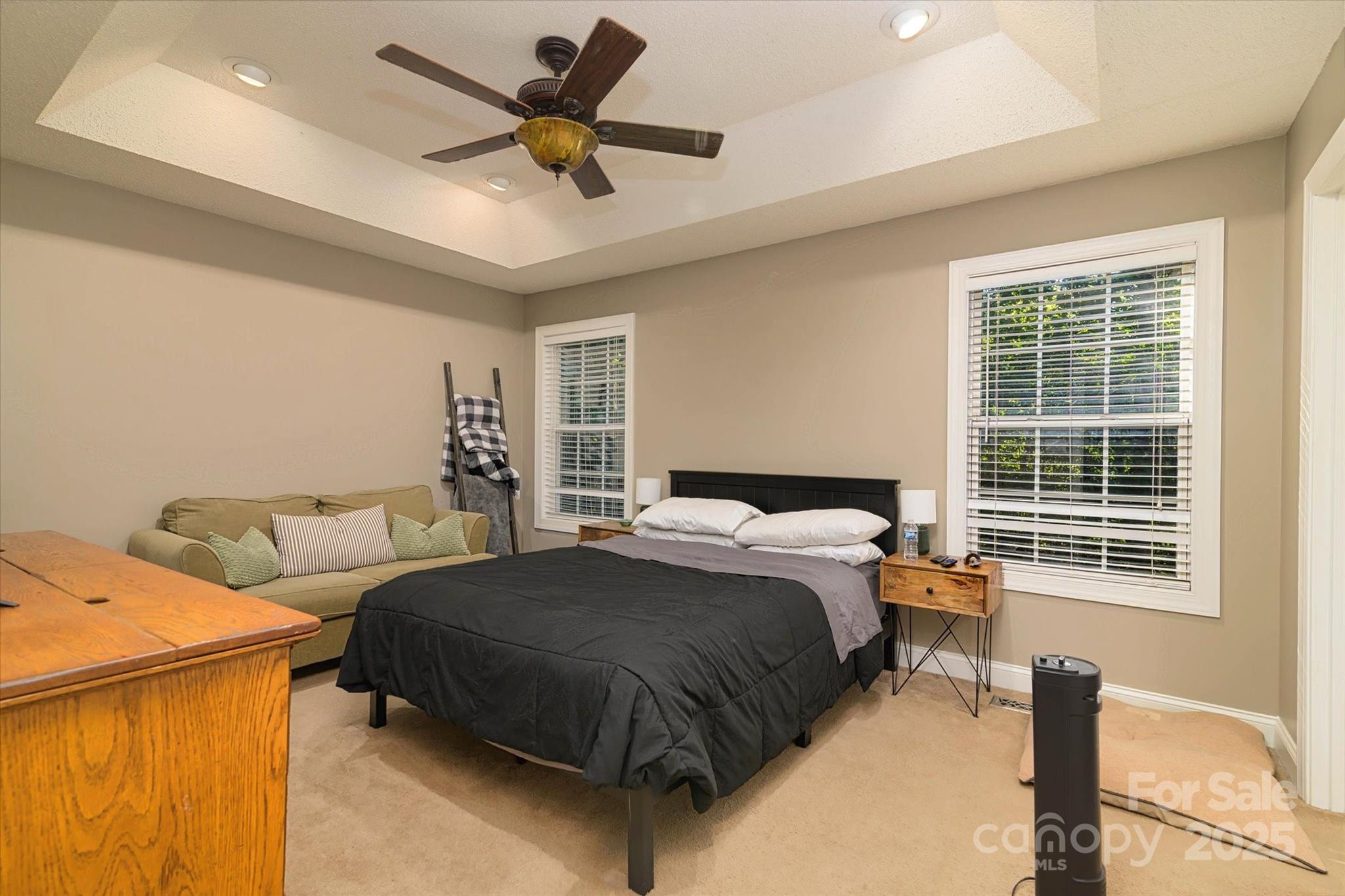 914 Ragin Lane Rock Hill, SC 29732 - Photo 20 of 31 a bedroom with a bed and wooden floor