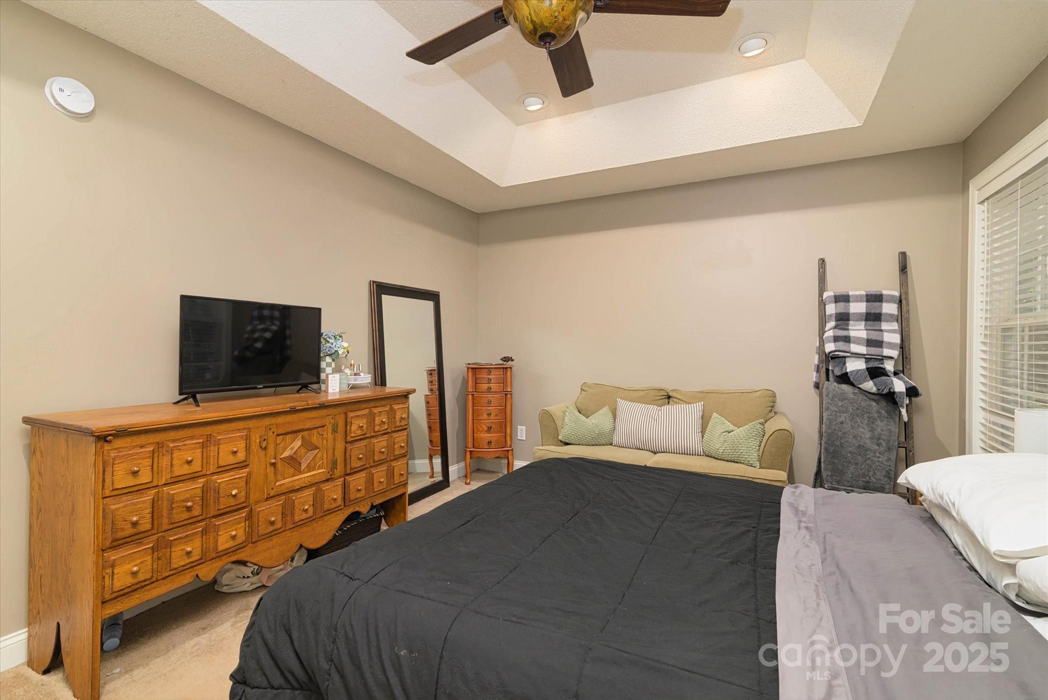 914 Ragin Lane Rock Hill, SC 29732 - Photo 22 of 31 a bedroom with a bed and flat screen tv