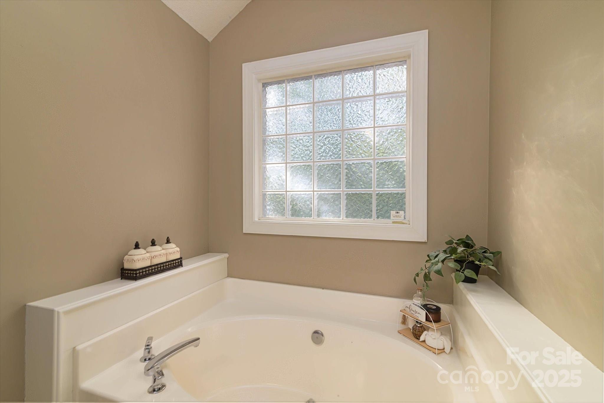 914 Ragin Lane Rock Hill, SC 29732 - Photo 24 of 31 a bathroom with a tub sink and a window