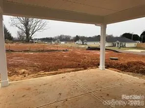 a view of lake with green space