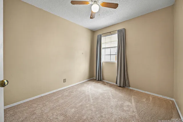 an empty room that has a window