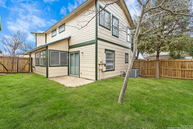a view of a backyard with a garden