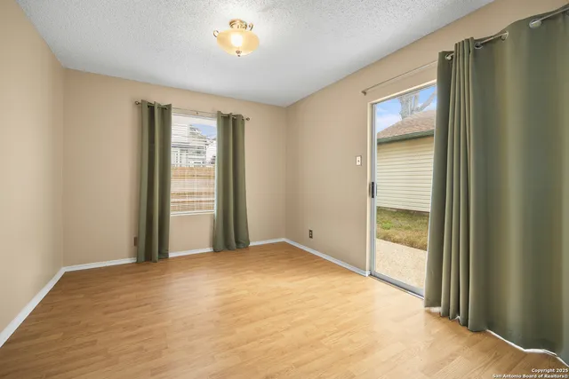 a kitchen with a sink stove and microwave