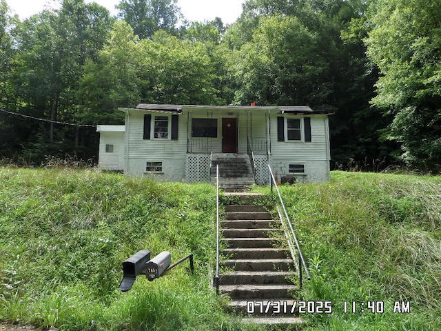 7652 Dicks Creek Road New Castle, VA 24127 - Photo 1 of 1 a view of a house with backyard