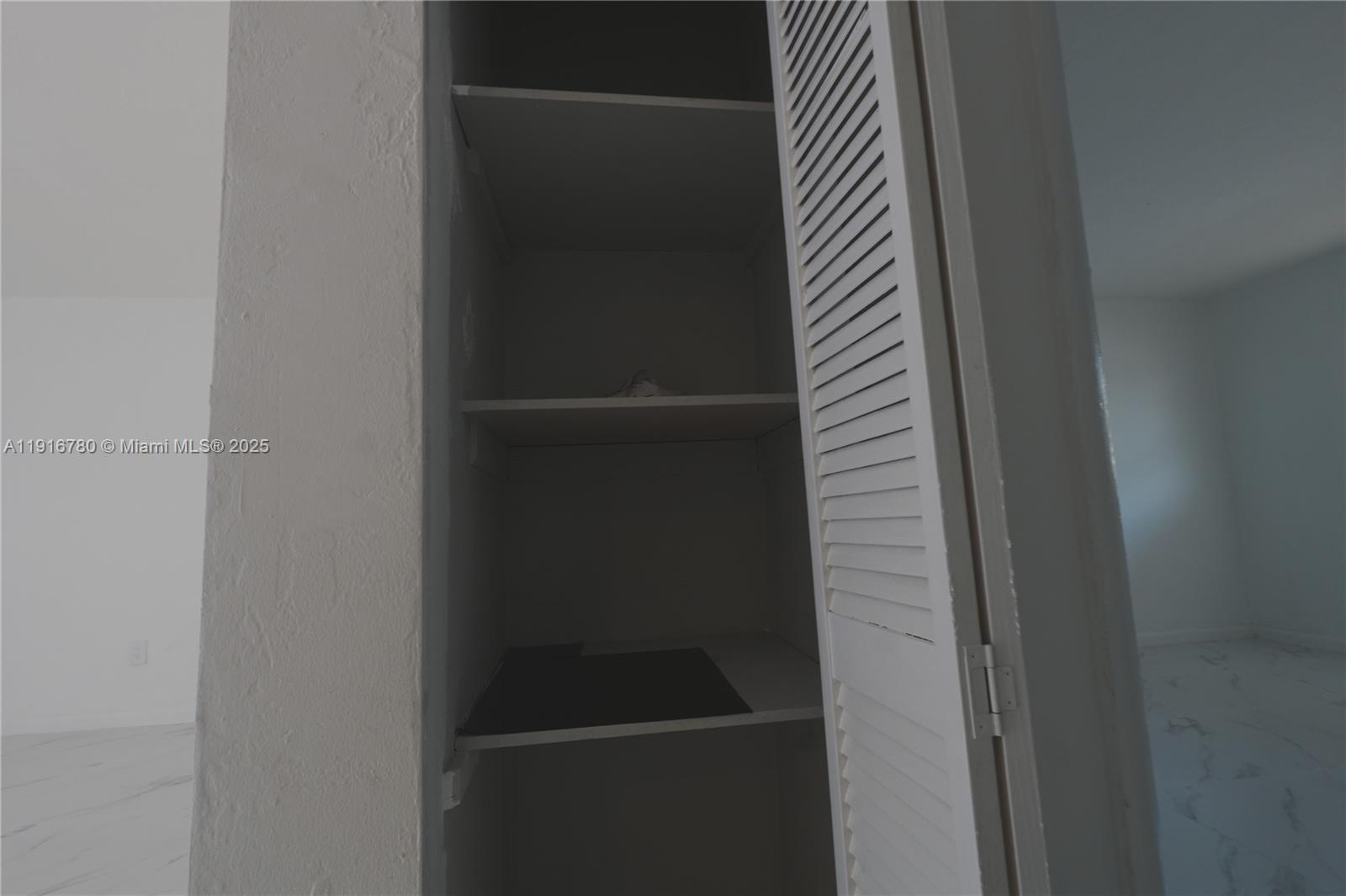 1245 West 24th Street, Unit 210 Hialeah, FL 33010 - Photo 17 of 22 a close view of closet