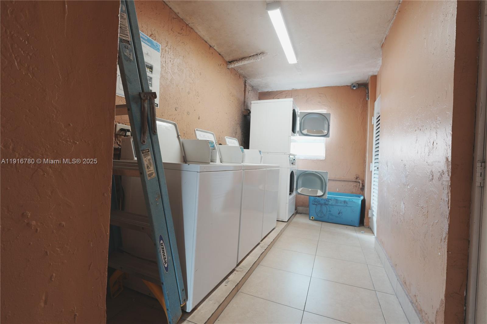 1245 West 24th Street, Unit 210 Hialeah, FL 33010 - Photo 21 of 22 a view of a storage & utility room with a sink