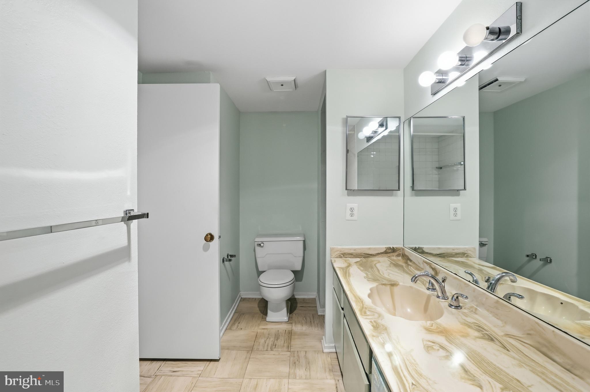 6101 Edsall Road, Unit 502 Alexandria, VA 22304 - Photo 20 of 33 Wide vanity countertops and ample storage
