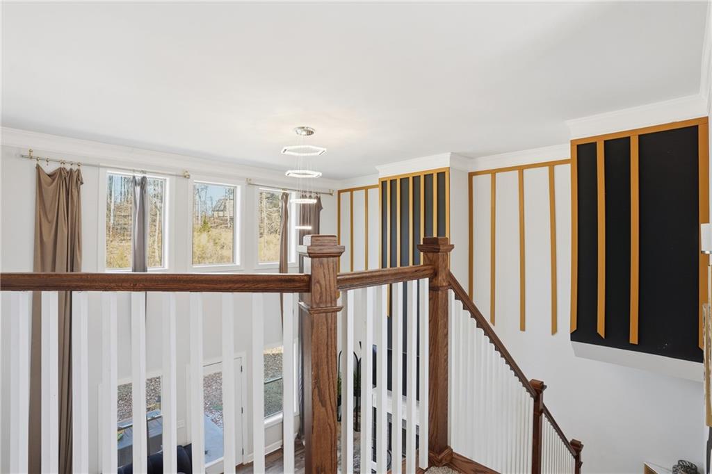 5663 Eternal Drive Atlanta, GA 30349 - Photo 14 of 37 a view of an entryway with staircase