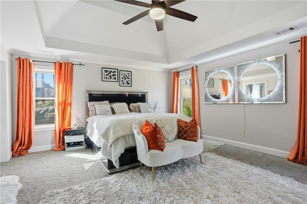 5663 Eternal Drive Atlanta, GA 30349 - Photo 17 of 37 a bedroom with a bed and a window