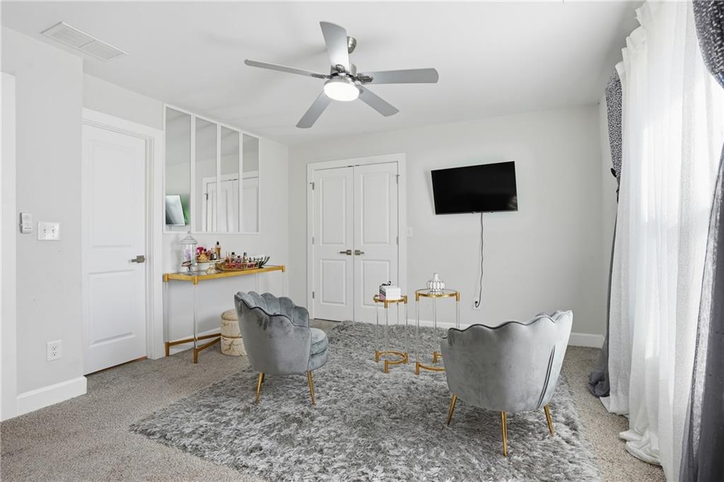 5663 Eternal Drive Atlanta, GA 30349 - Photo 28 of 37 a view of a dining room with furniture