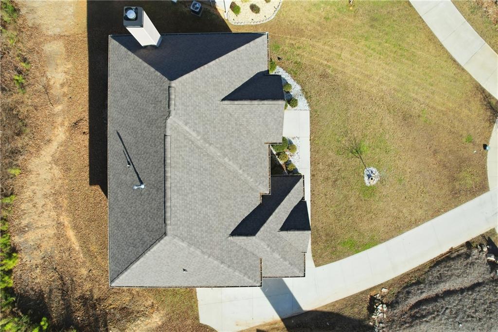 5663 Eternal Drive Atlanta, GA 30349 - Photo 33 of 37 a bathroom with a shower
