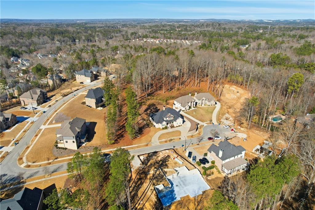 5663 Eternal Drive Atlanta, GA 30349 - Photo 36 of 37 an aerial view of residential houses with outdoor space