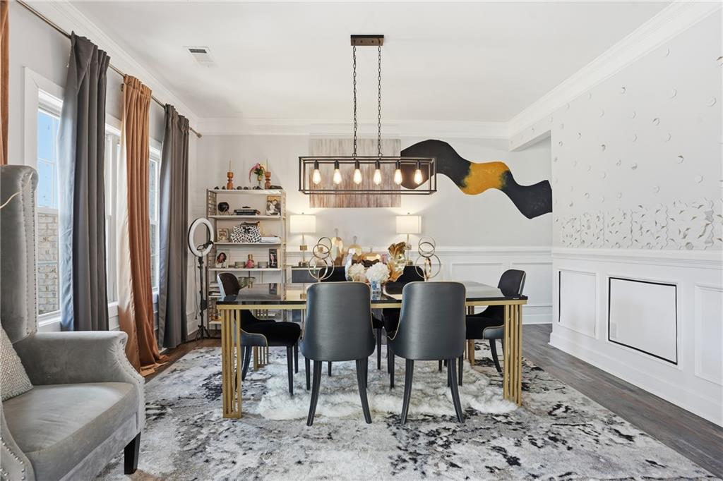 5663 Eternal Drive Atlanta, GA 30349 - Photo 4 of 37 a view of a dining room with furniture