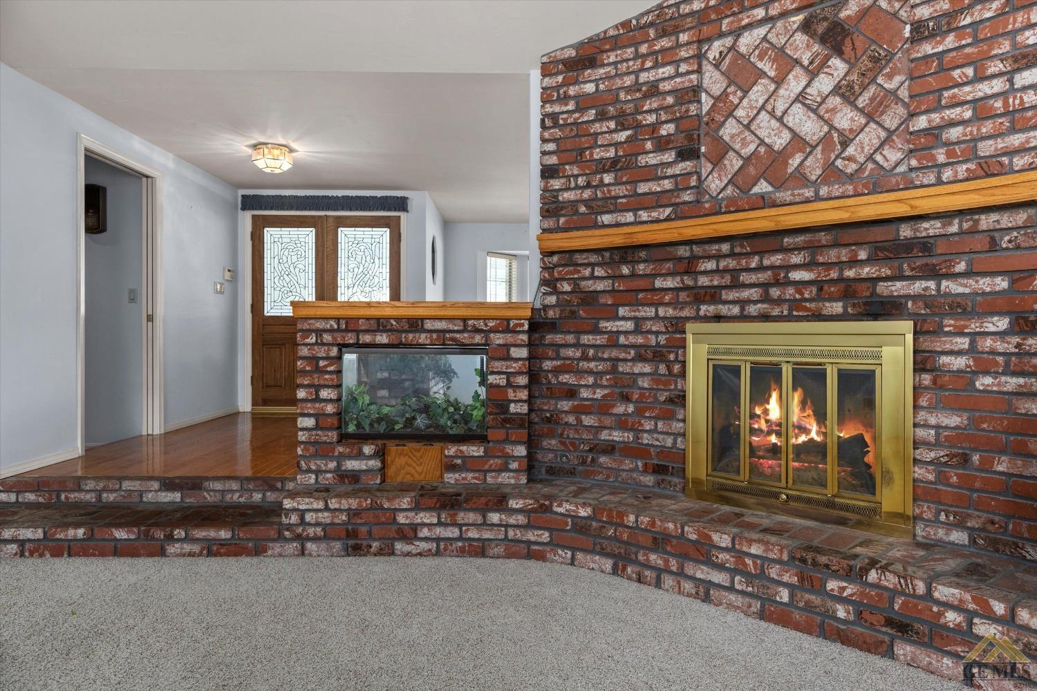 Undisclosed Address Bakersfield, CA 93312 - Photo 14 of 46 a front view of a building with garden