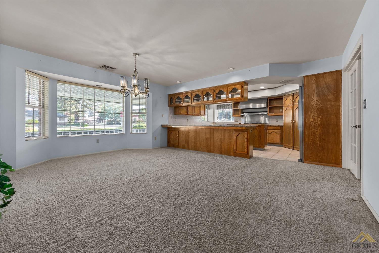 Undisclosed Address Bakersfield, CA 93312 - Photo 17 of 46 a view of an empty room with a window