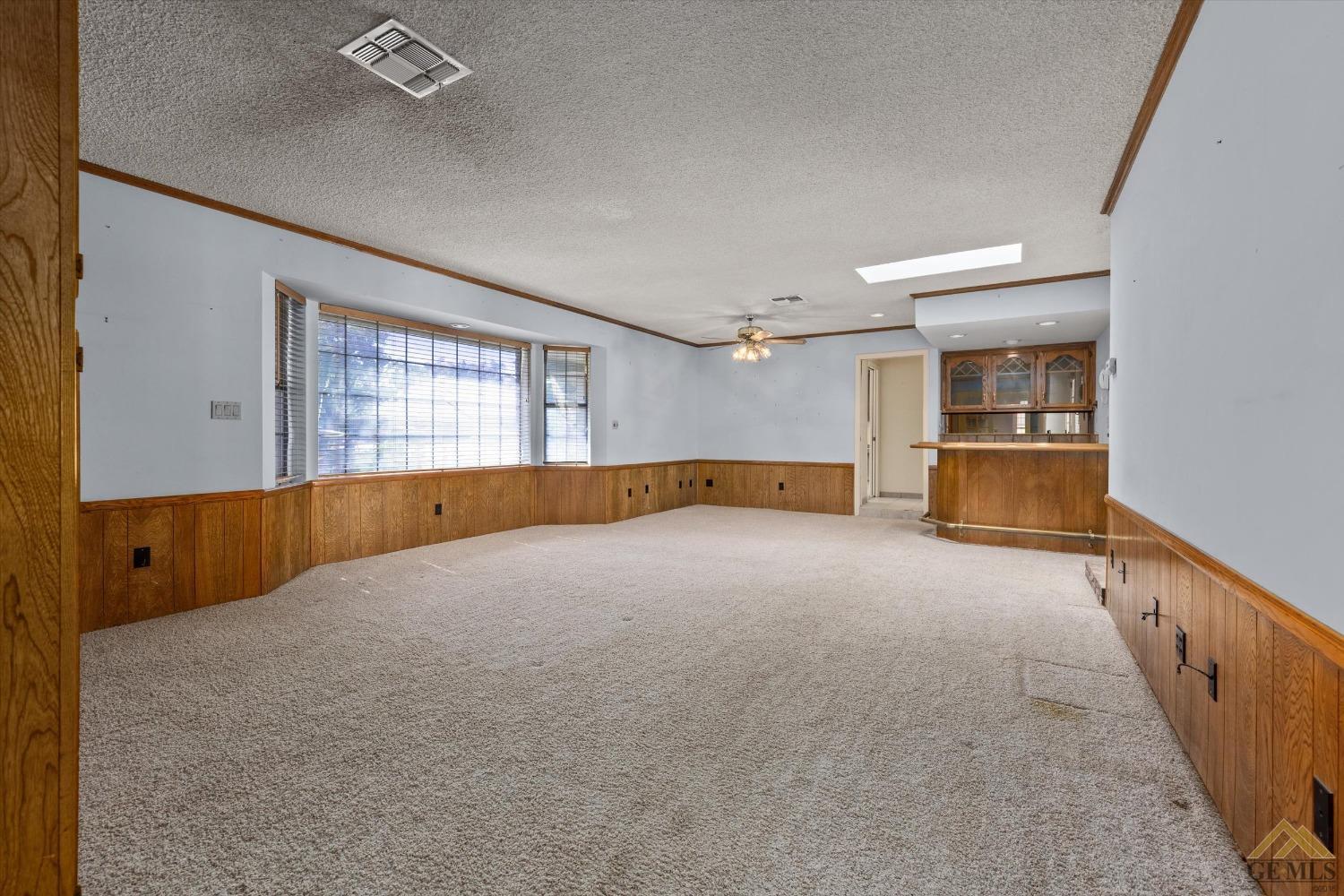 Undisclosed Address Bakersfield, CA 93312 - Photo 20 of 46 a view of an empty room with a window