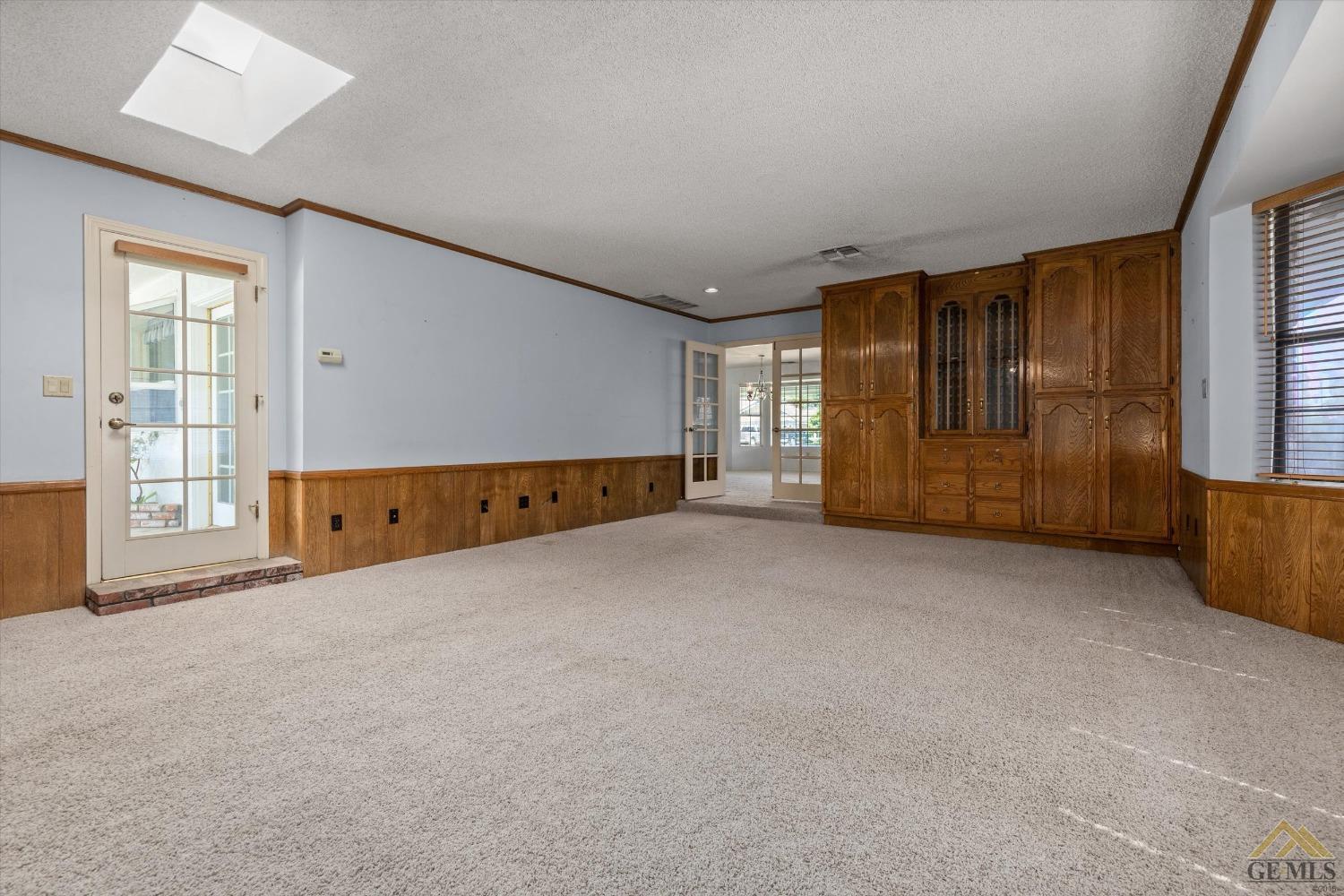 Undisclosed Address Bakersfield, CA 93312 - Photo 23 of 46 a view of an empty room with a window