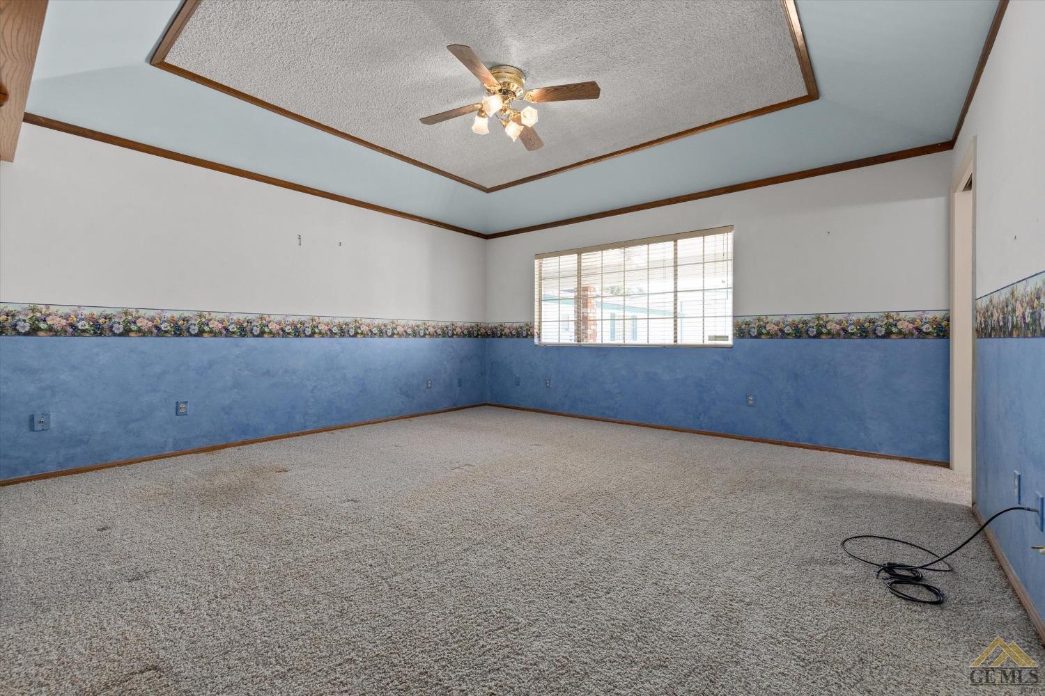 Undisclosed Address Bakersfield, CA 93312 - Photo 31 of 46 wooden floor in an empty room with a window