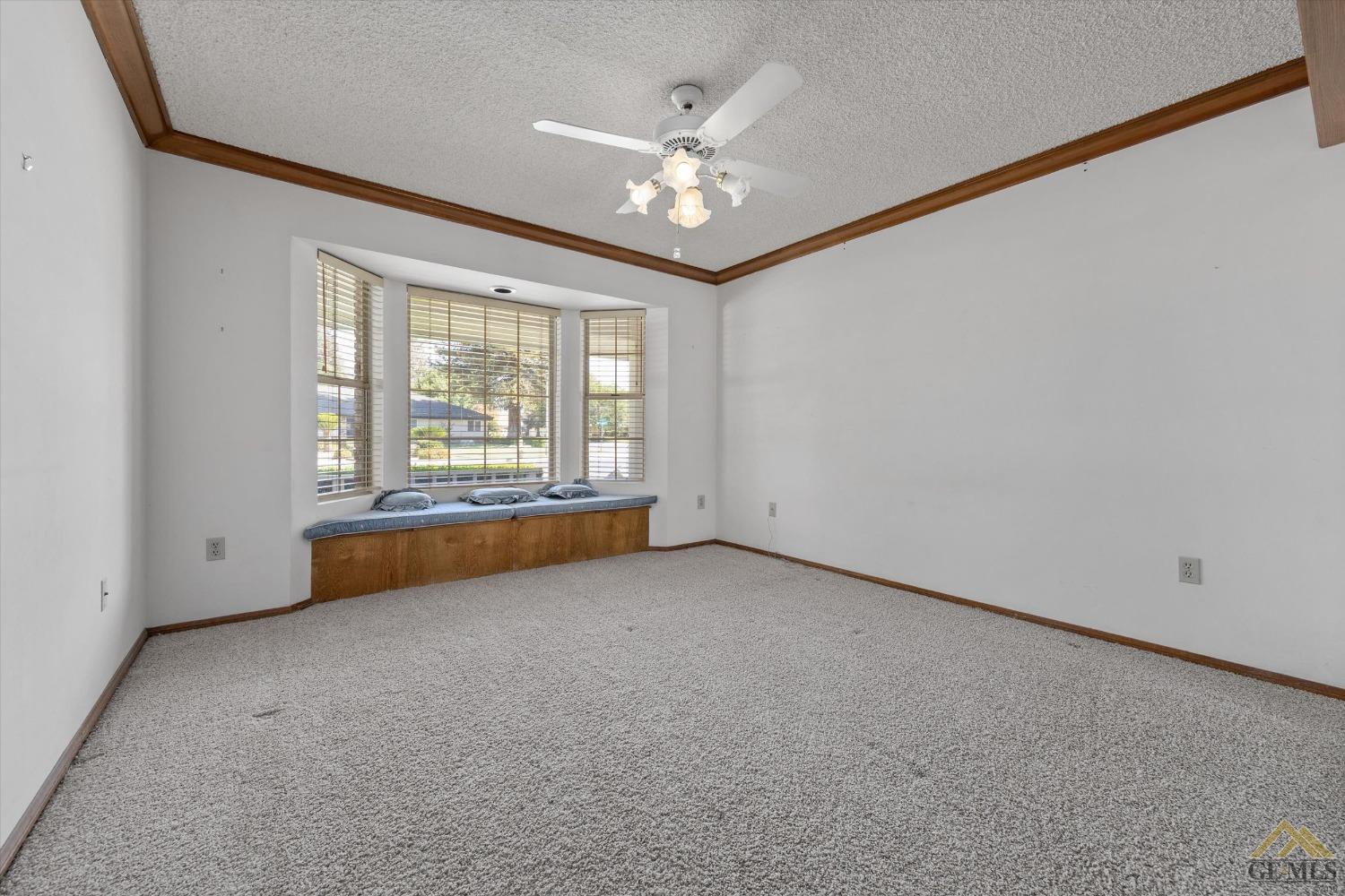 Undisclosed Address Bakersfield, CA 93312 - Photo 38 of 46 a view of an empty room with a window