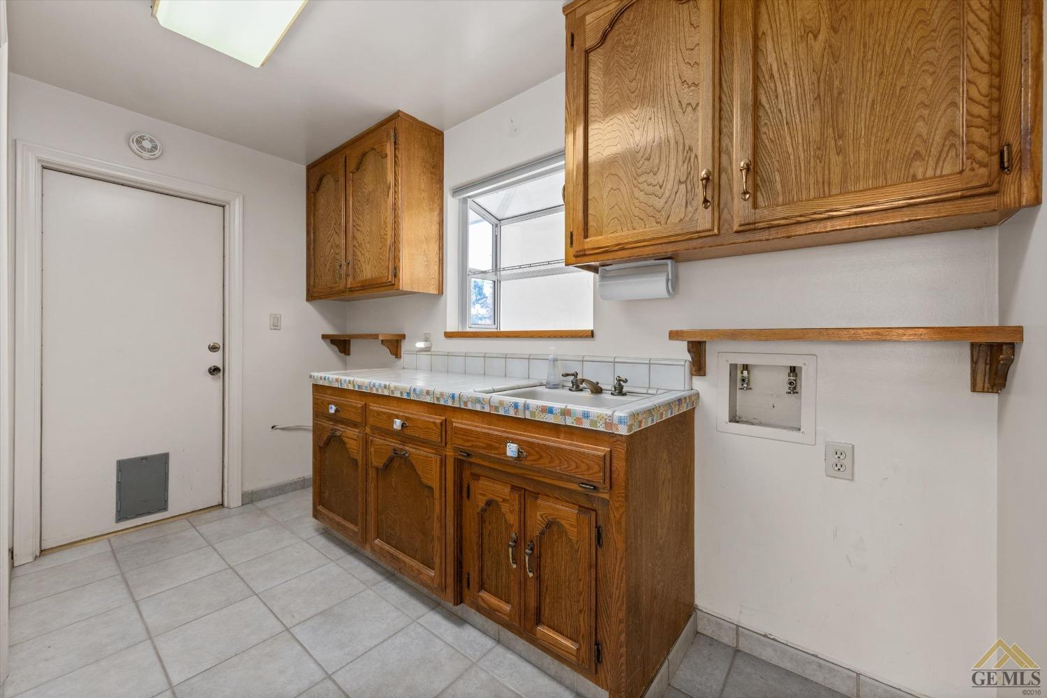 Undisclosed Address Bakersfield, CA 93312 - Photo 41 of 46 a kitchen with stainless steel appliances granite countertop a refrigerator and a stove