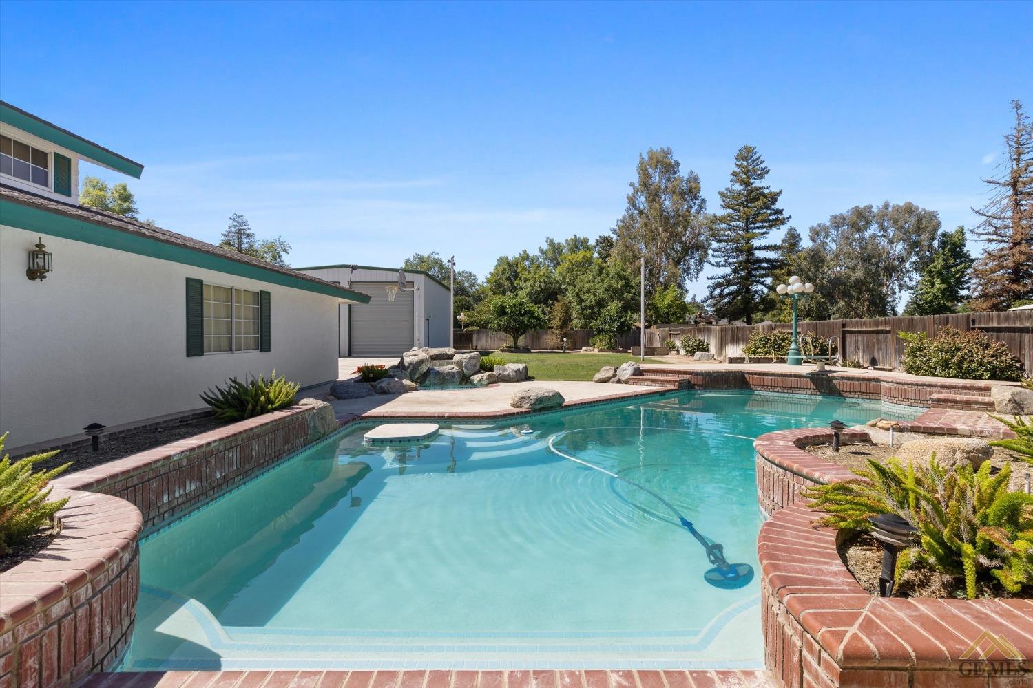 Undisclosed Address Bakersfield, CA 93312 - Photo 42 of 46 a view of swimming pool with outdoor seating