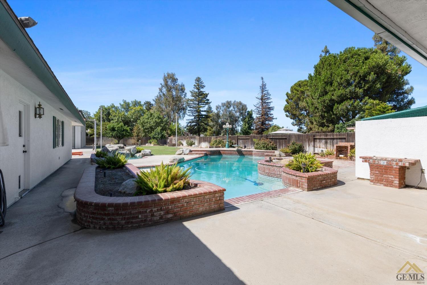 Undisclosed Address Bakersfield, CA 93312 - Photo 43 of 46 a view of a patio with couches chairs and a potted plant