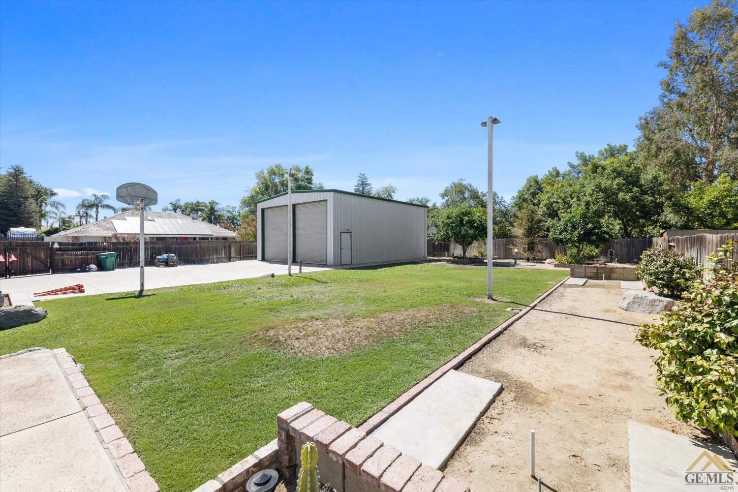 Undisclosed Address Bakersfield, CA 93312 - Photo 46 of 46 a view of a backyard