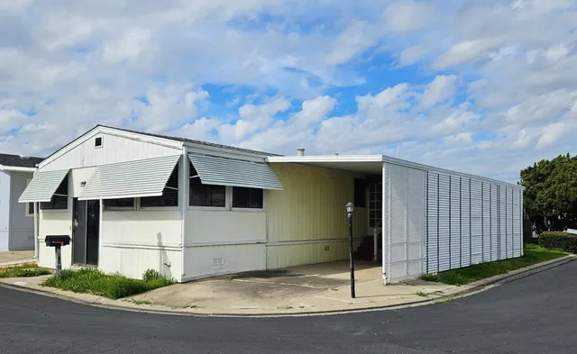 a view of a livingroom with wooden floor