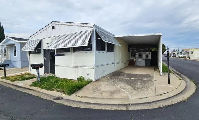 a front view of a house having yard