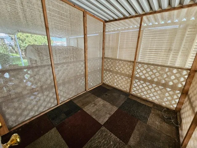 a view of a livingroom from a hallway