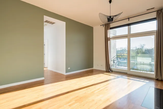 a view of a room with a large window