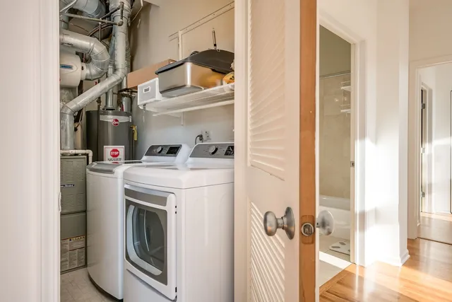 a utility room with dryer and washer