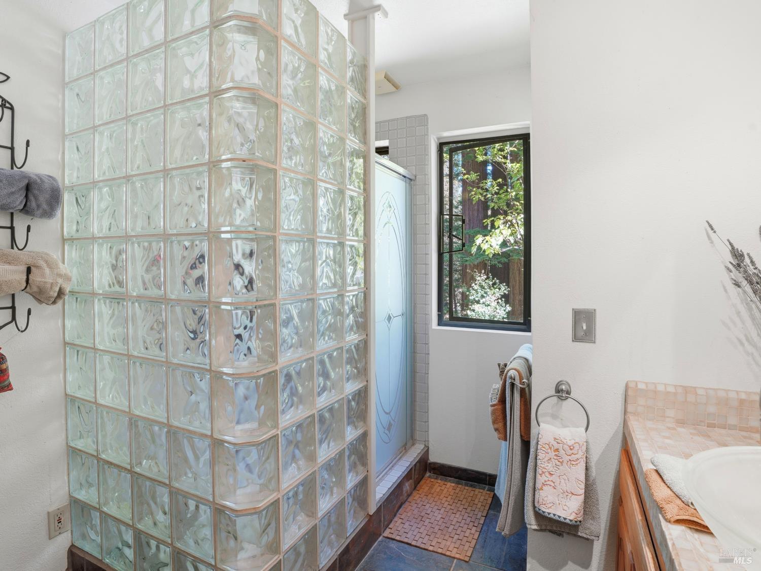 31397 Seaview Road Cazadero, CA 95421 - Photo 23 of 47 a view of a room with windows and wooden floor