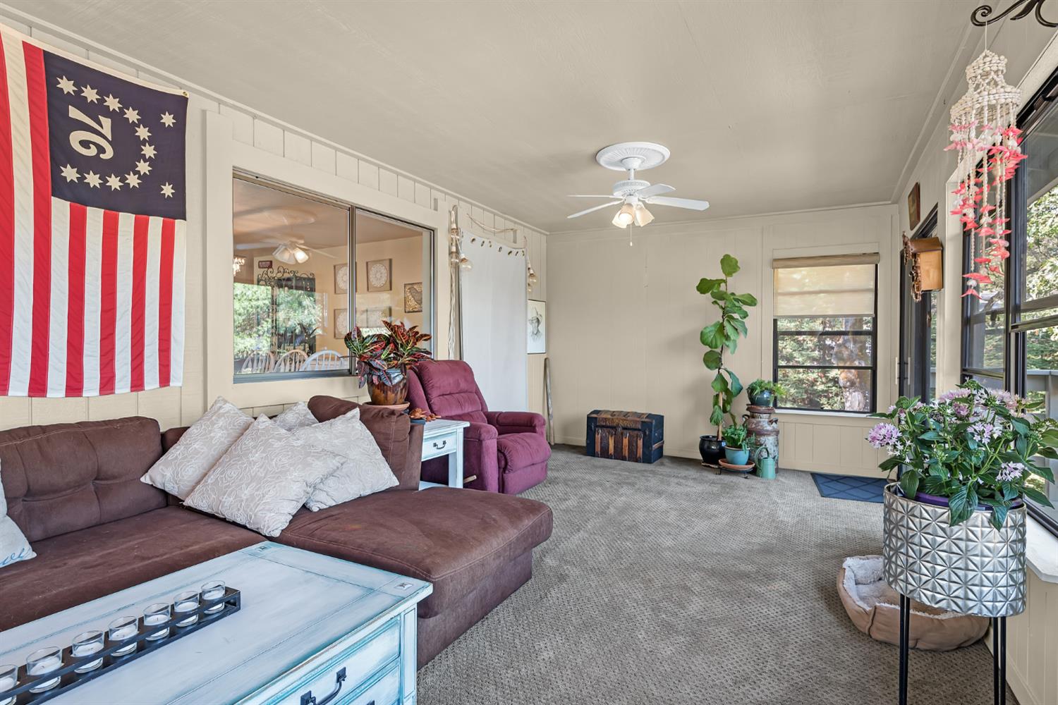 2505 Muir Court Cool, CA 95614 - Photo 12 of 56 a living room with furniture and a large window