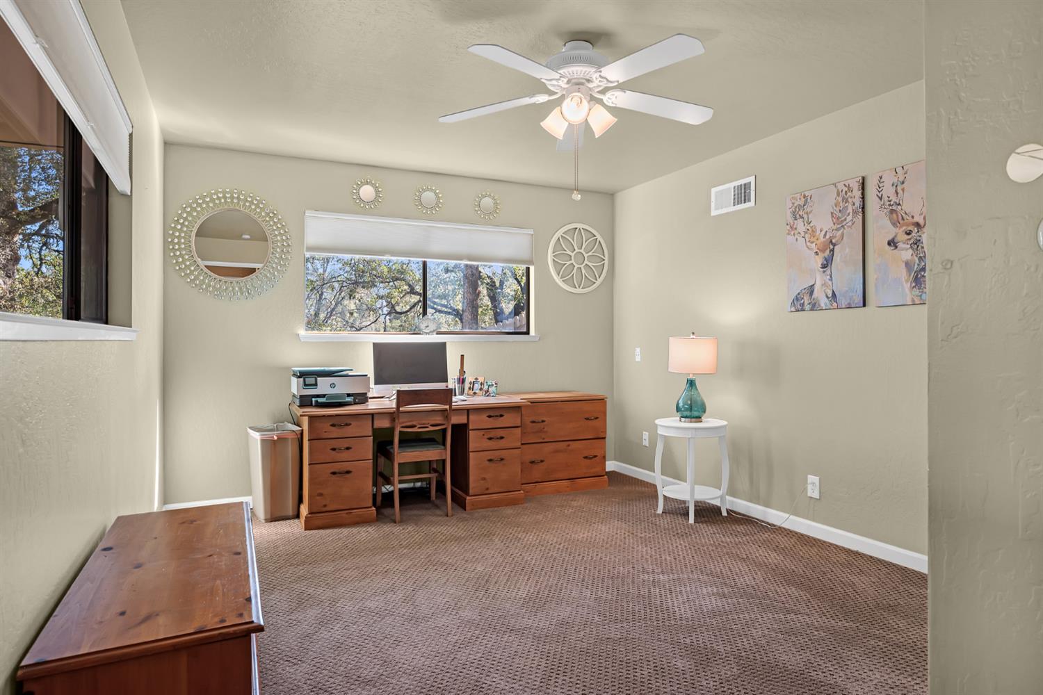 2505 Muir Court Cool, CA 95614 - Photo 20 of 56 a view of a workspace with furniture and a window