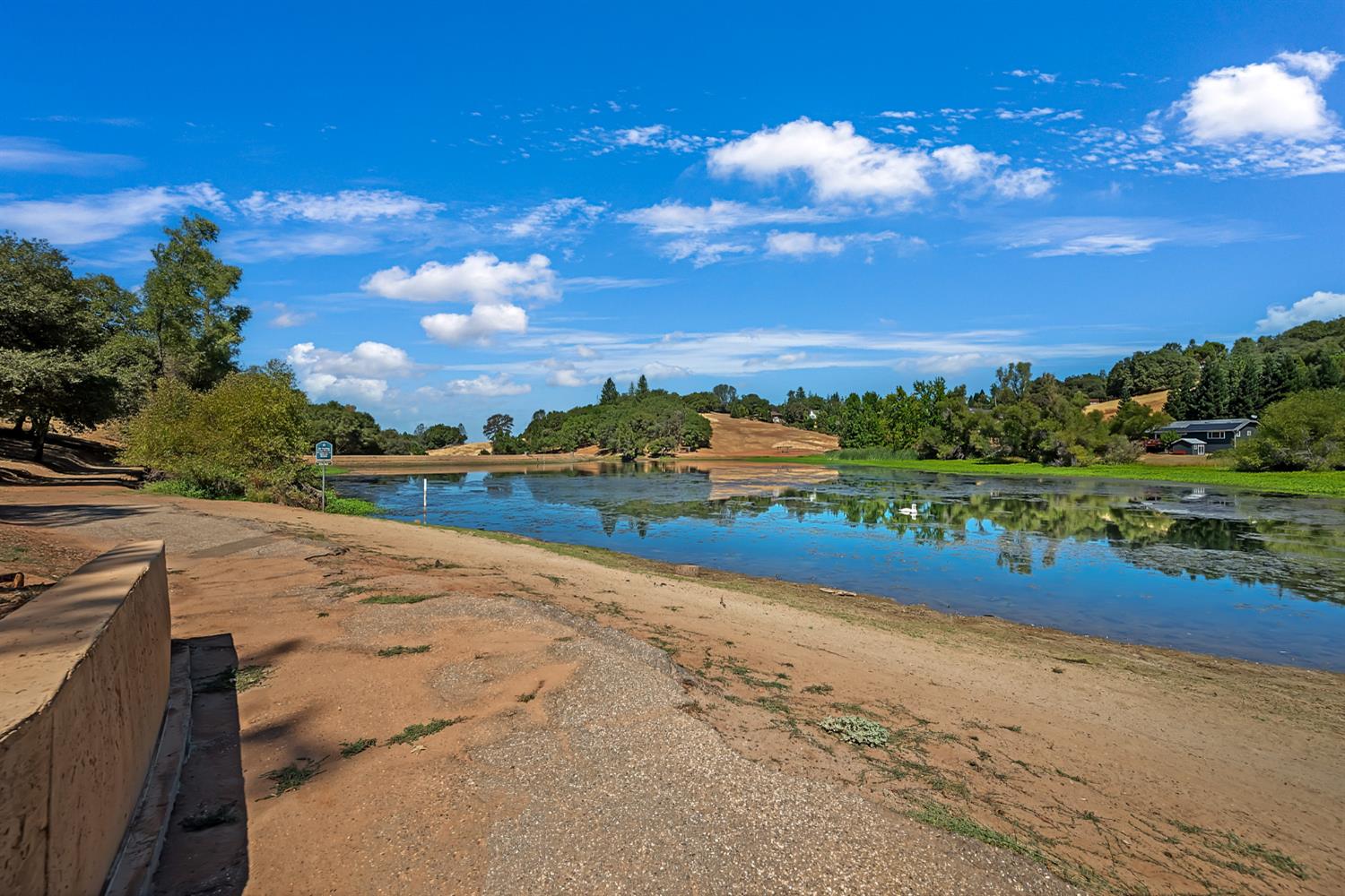 2505 Muir Court Cool, CA 95614 - Photo 36 of 56 a view of a lake with a big yard