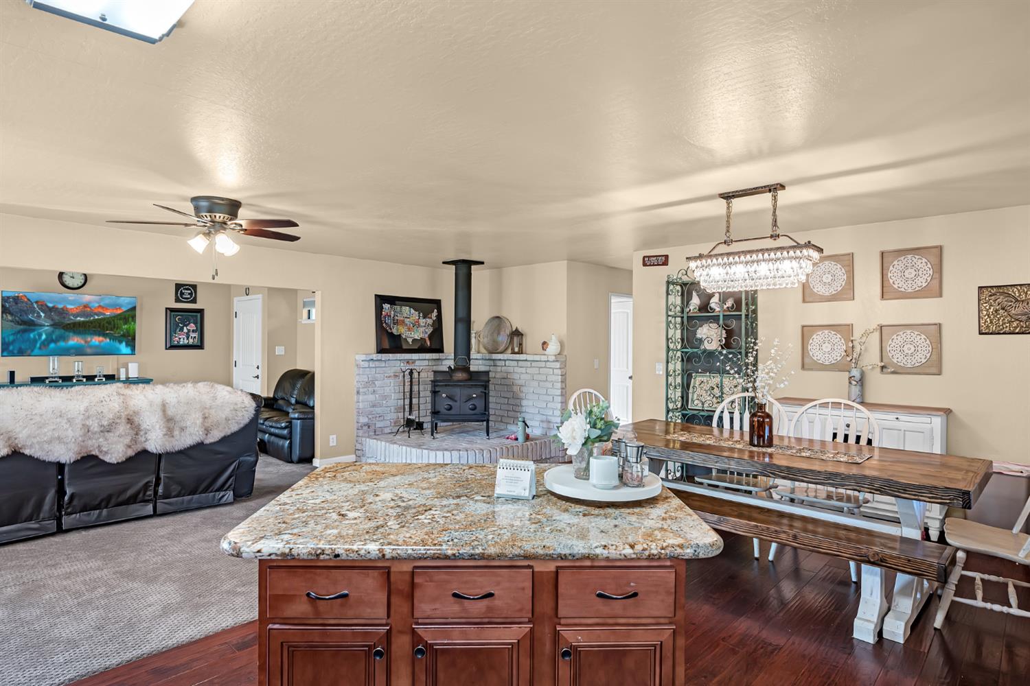 2505 Muir Court Cool, CA 95614 - Photo 7 of 56 a kitchen with a table chairs and wooden floor
