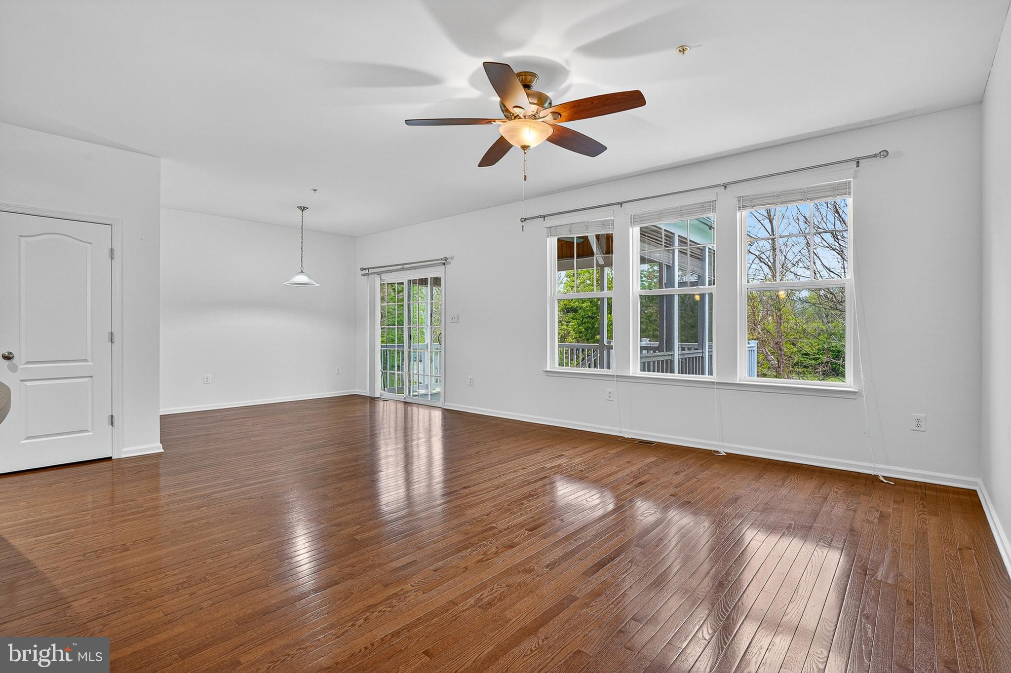 1925 Washburn Court Frederick, MD 21702 - Photo 15 of 41 a view of an empty room with wooden floor and a window