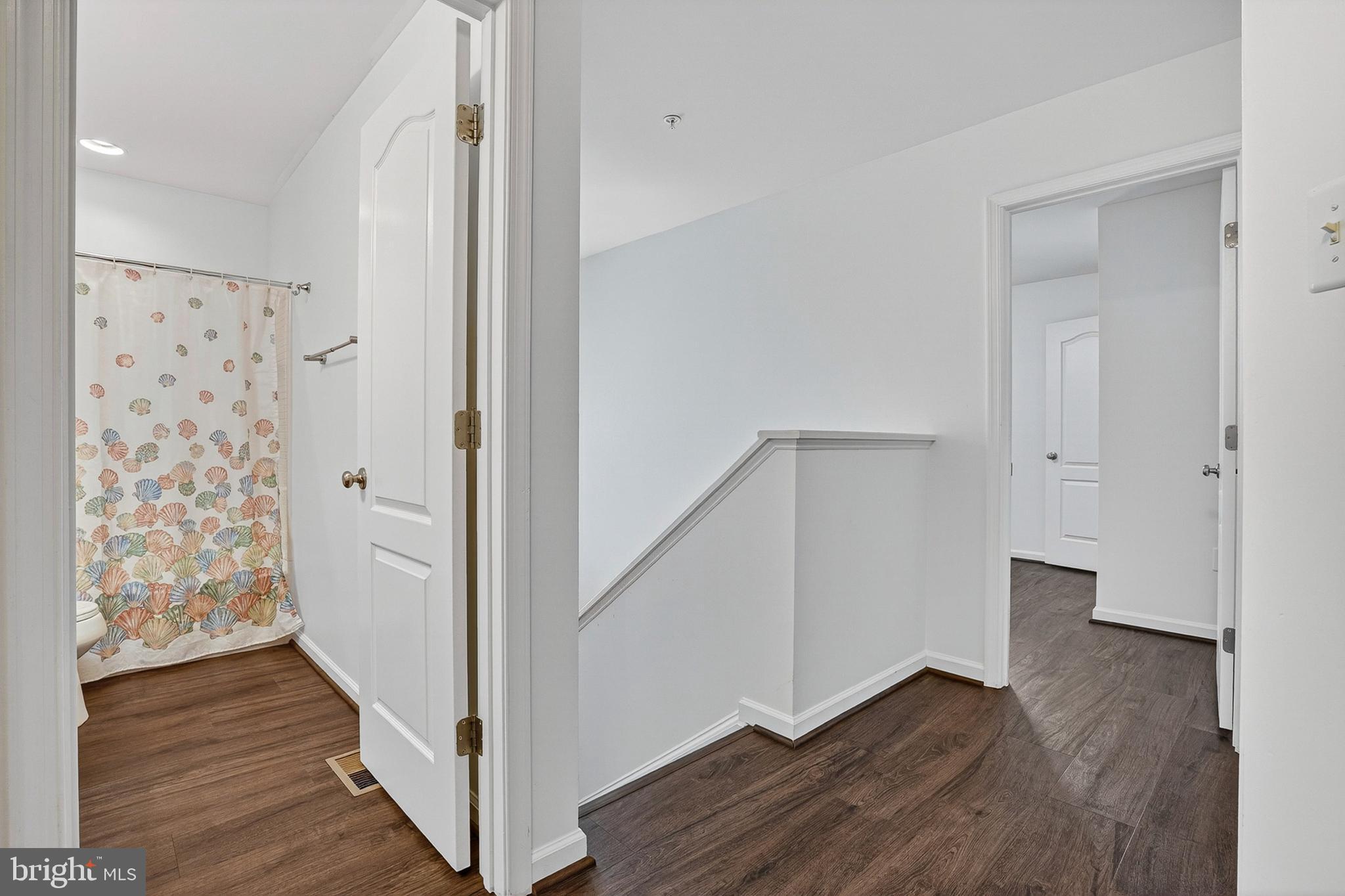 1925 Washburn Court Frederick, MD 21702 - Photo 22 of 41 a view of a hallway with wooden floor and staircase