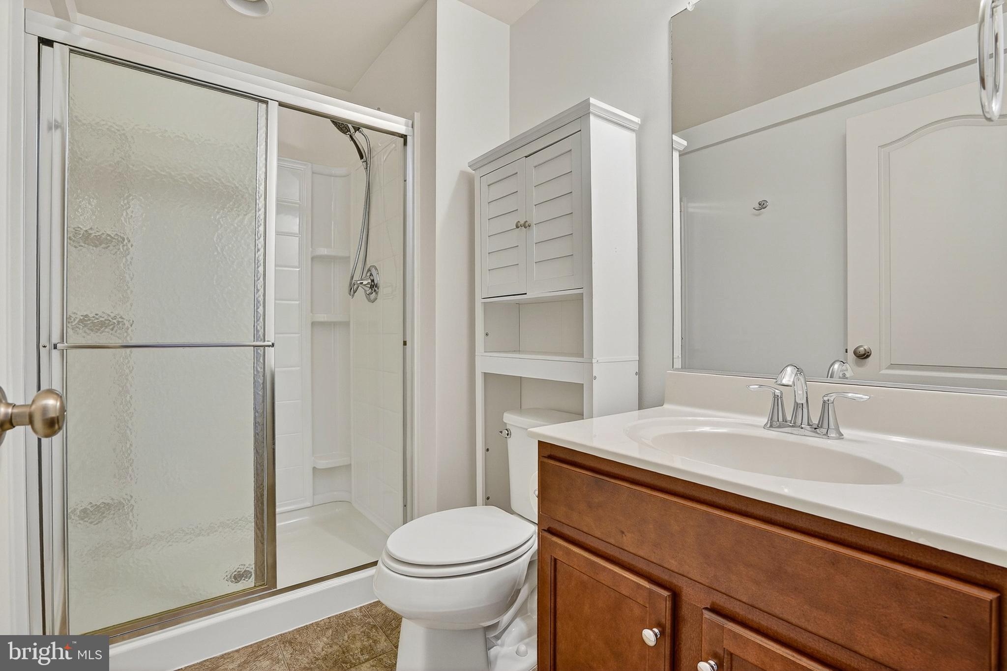 1925 Washburn Court Frederick, MD 21702 - Photo 33 of 41 a bathroom with a sink toilet and shower