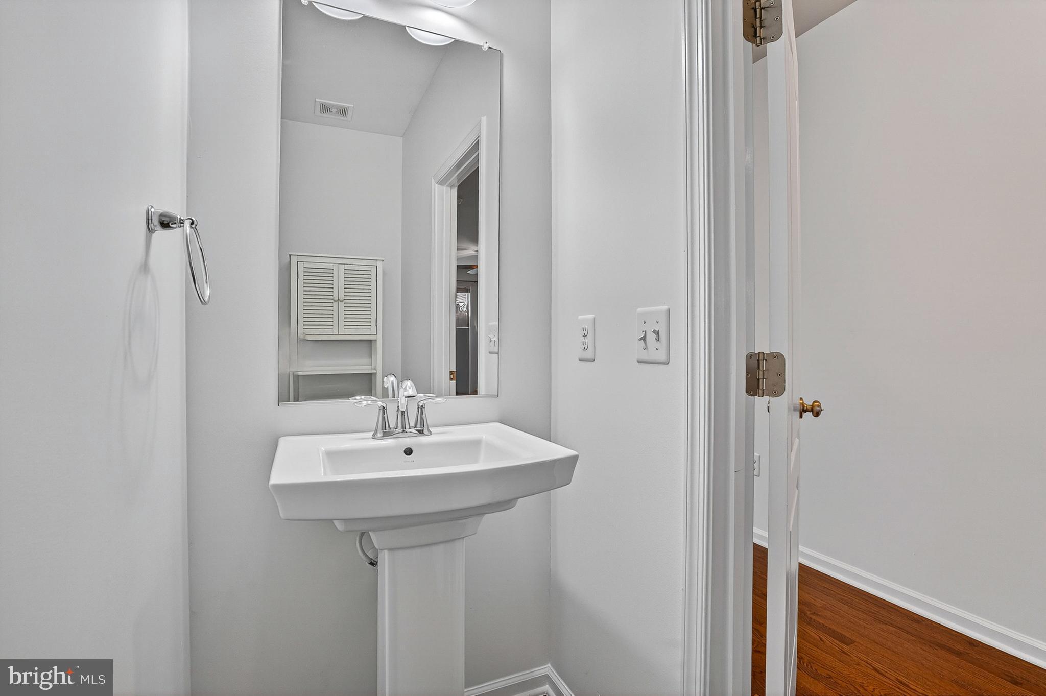 1925 Washburn Court Frederick, MD 21702 - Photo 7 of 41 a bathroom with a sink and a mirror